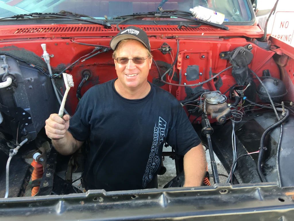 Mike-Cleaning-Engine-Bay.jpg
